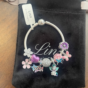 Linx Silver Snake Chain Bracelet with Light Purple Pale Pink and Baby Blue Themed Charms