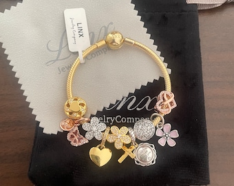 Linx Charm Bracelet: Yellow Gold Snake Chain, Sterling Silver Charms