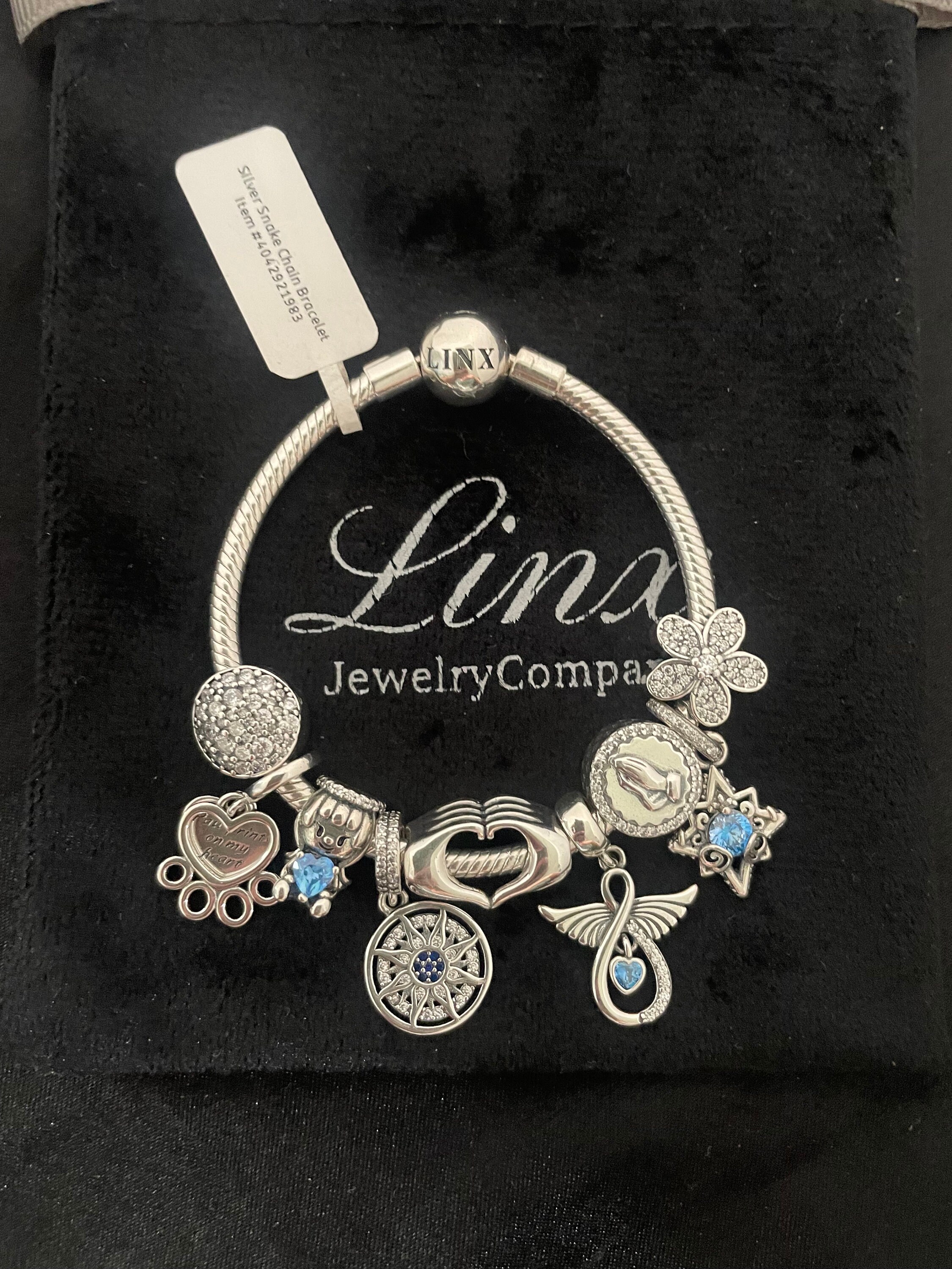 Linx Snake Chain Bracelet With Blue and Silver Angel Themed Charms