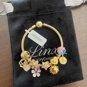 Linx Yellow Gold Snake Chain Bracelet with Gold Pink and  Mom Themed Charms