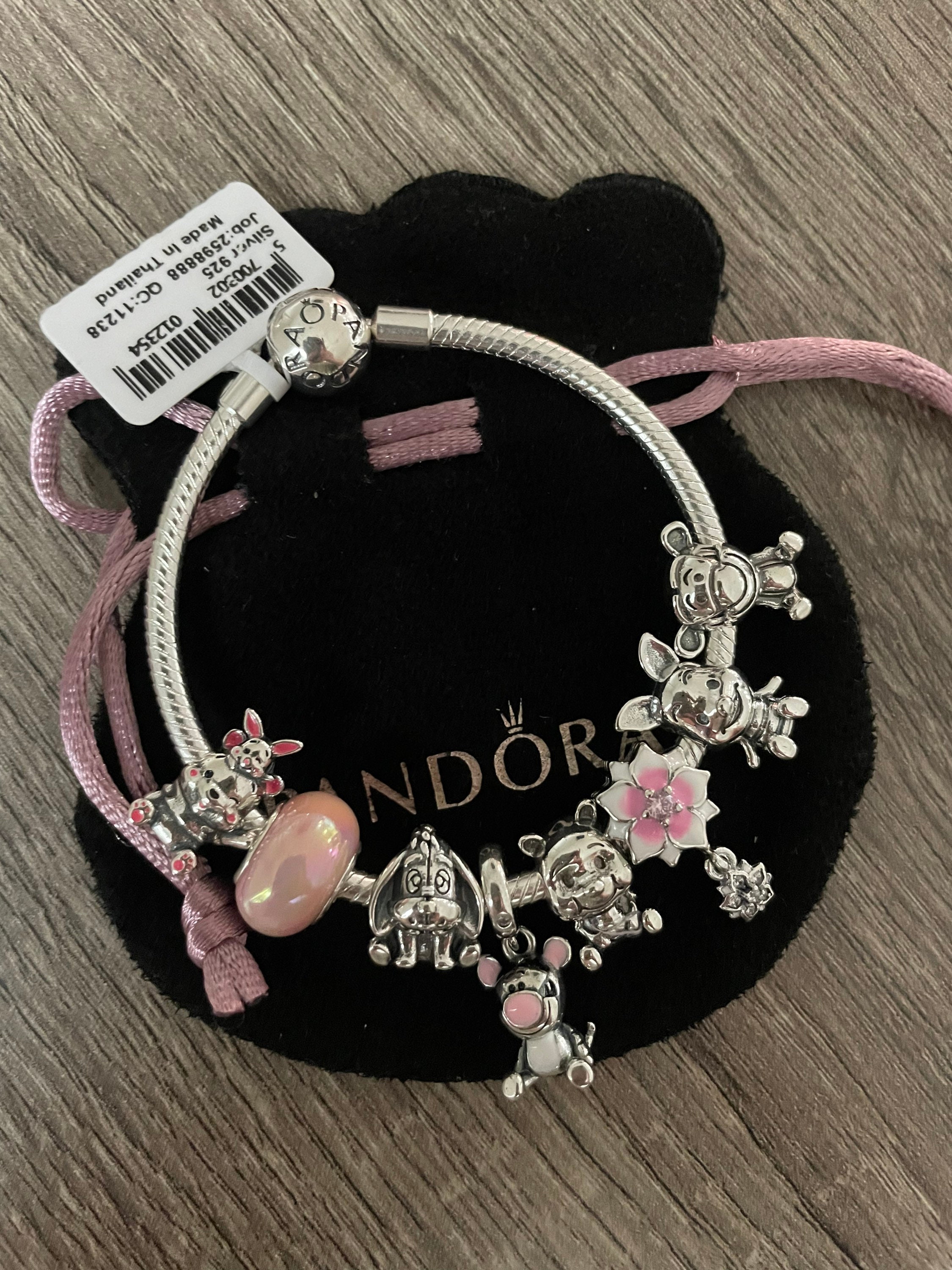 Pandora Bracelet With Pink and White Themed Charms 