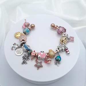 Linx Rose Gold Open Bangle with Cruise Themed Charms