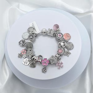 Linx Silver Snake Chain Bracelet with Silver and Pink Themed Charms