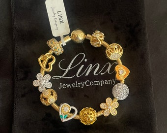 Linx Yellow Gold Snake Chain Bracelet With Sunflower Themed  display picture 1
