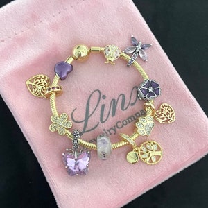 Linx Yellow Gold Snake Chain Bracelet with Purple Themed Charms