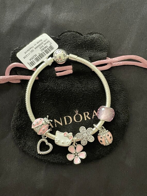 Pandora Bracelet With Light Pink Themed Charms 