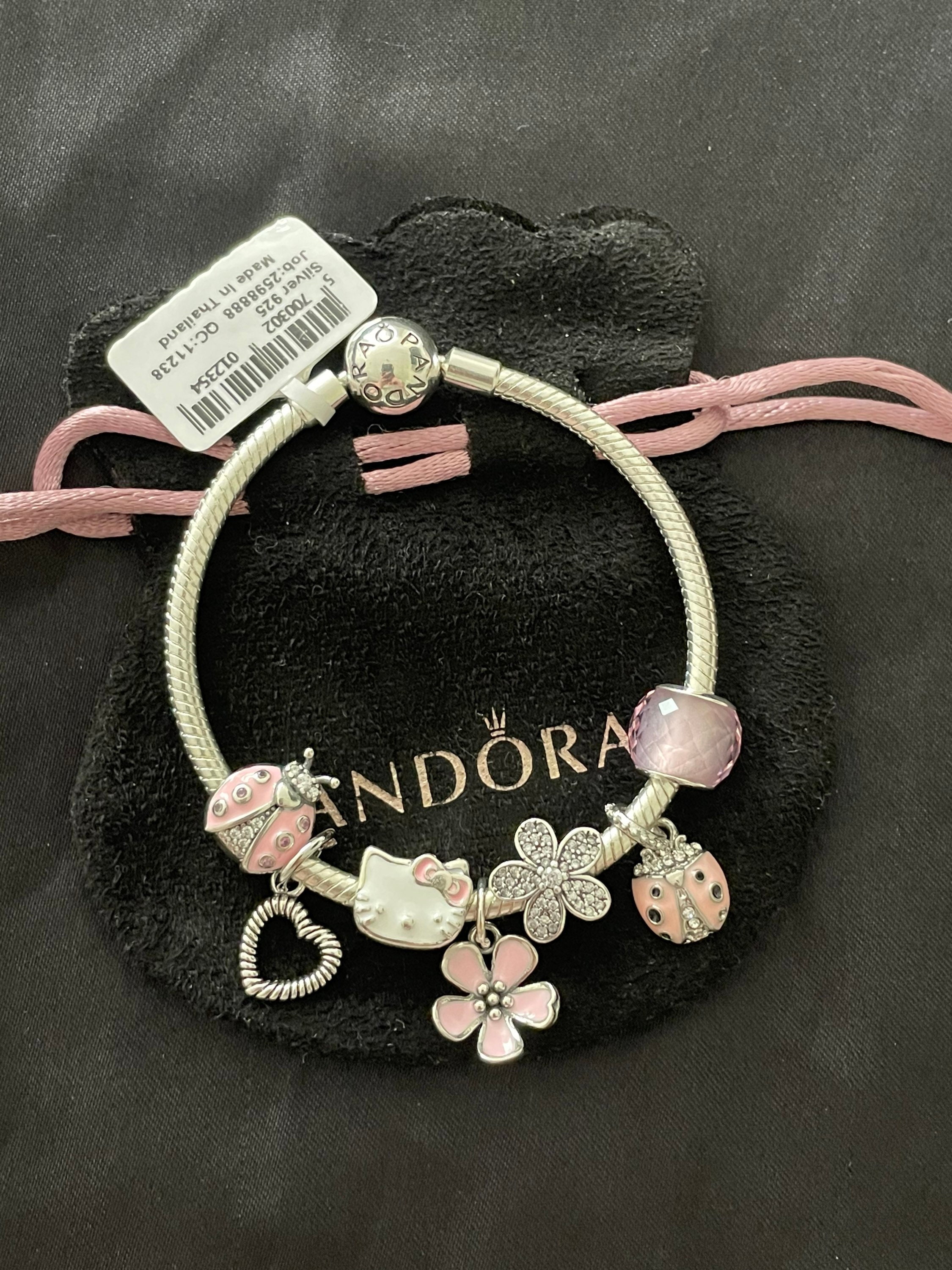 Pandora Bracelet with Light Pink Themed Charms