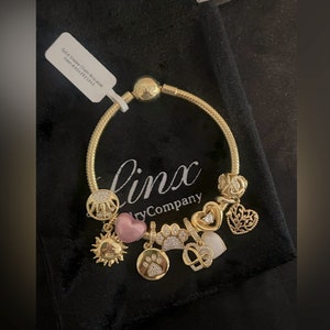 Linx Yellow Gold Snake Chain Bracelet with Gold Charms