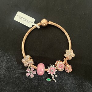 Linx Rose Gold Snake Chain Bracelet with Rose Gold and Pale Pink Themed Charms