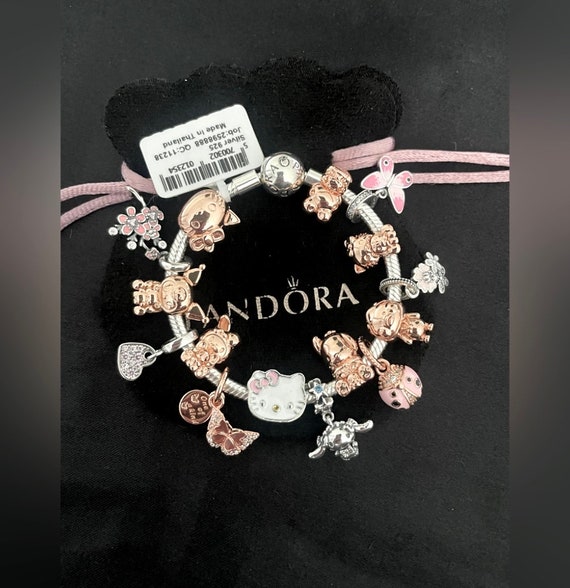 Pandora Bracelet With Pink and Rose Gold Character Themed Charms 