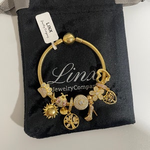 Linx Yellow Gold Snake Chain Bracelet with Gold Charms
