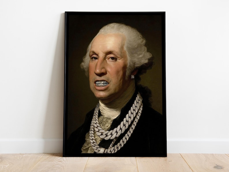 May include: A framed portrait print of George Washington wearing two thick, silver-toned diamond-encrusted chain necklaces and a matching diamond grill over the teeth. The figure has white powdered hair and wears a dark coat with a white cravat.