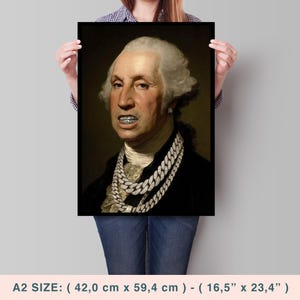 May include: A rectangular wall art print featuring a portrait of George Washington wearing silver diamond-encrusted grillz and two thick silver chain necklaces. The print measures 42.0 cm by 59.4 cm, corresponding to A2 size dimensions.