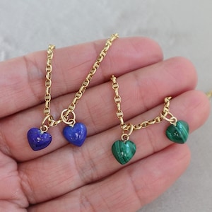Malachite and lapis lapislazuli small heart pendants made in 18 carat gold