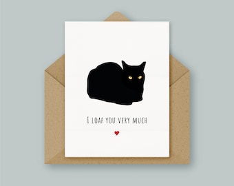 May include: A greeting card with a black cat illustration and the text "I loaf you very much" with a small red heart.