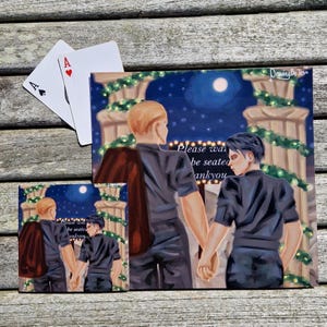 May include: An artwork depicting two figures holding hands, set under a night sky with a full moon and classical columns. The artwork includes the text "Please wait to be seated, thank you." Two playing cards, an Ace of Spades and an Ace of Hearts, are also present.
