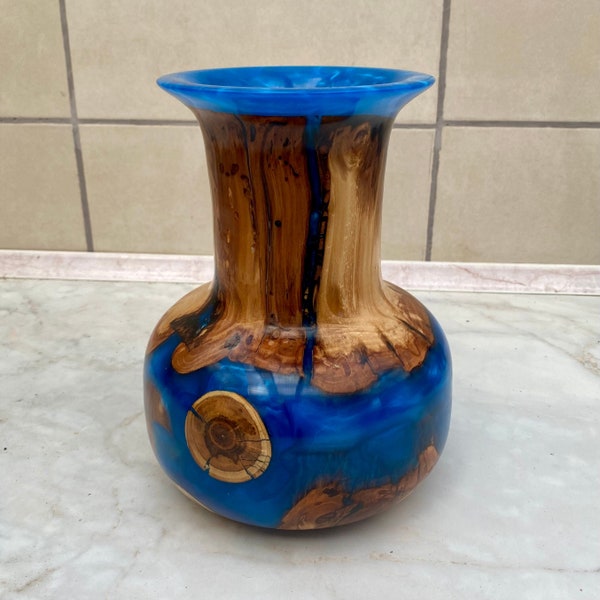 Decorative vase made from apple wood and epoxy resin, turned on a lathe.