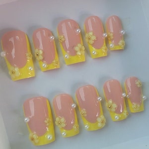 pastel Yellow French tip press on nails with flower charms