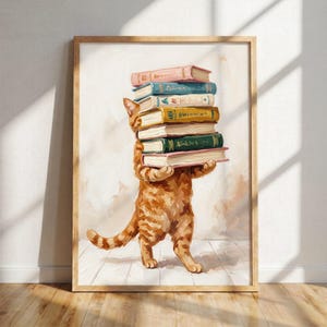 Könnte beinhalten: Ein gerahmtes Gemälde einer orangefarbenen getigerten Katze, die auf ihren Hinterbeinen steht und einen vertikalen Stapel aus sechs bunten Büchern auf dem Kopf balanciert. Die Katze hat eine texturierte, malerische Optik.