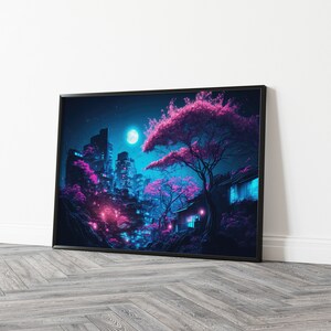 May include: A framed art print depicting a nighttime cityscape with a Japanese aesthetic. The scene features illuminated buildings, pink cherry blossom trees, and a full moon in a dark blue sky. The artwork is framed in black and leans against a white wall.
