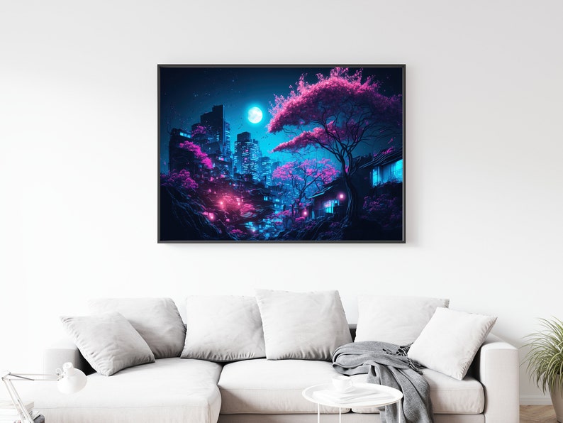 May include: A framed art print depicts a neon-lit cityscape with pink cherry blossom trees under a full moon. The buildings are tall and modern, with vibrant blue and pink lighting. The artwork is displayed above a white sofa.