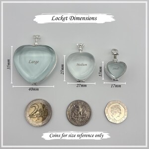 May include: Three heart-shaped lockets in silver, labeled Large (40mm x 35mm), Medium (27mm x 27mm), and Small (17mm x 17mm). The image includes coins for size comparison. Text reads "Locket Dimensions" and "Coins for size reference only."
