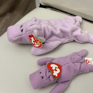 Vintage New Happy the Hippo-Ty Beanie and Teenie Babies-With tags in Pristine condition. Comes from a smoke free home.  Beanie Original Baby