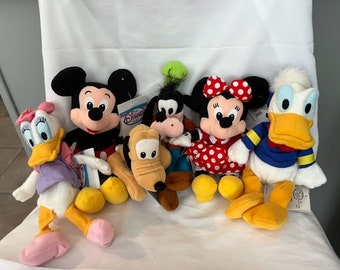 Original Disney Bean Bag Plushies in Pristine and New Condition with tags- Comes from a smoke free home and stored in plastic bins.