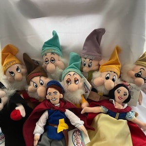 Pristine New With Tags Disney Mini Bean Bag Plushies, Snow White and The Seven Dwarfs, This includes the Wicked Witch and Prince Charming