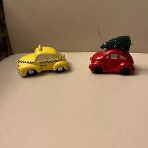 Vintage Dept 56- Snow Village Cars- Taxi and  Red Volkswagon with Tree on top. Ceramic/in pristine condition in original box.Smoke free home