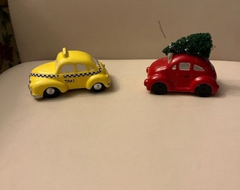 Vintage Dept 56- Snow Village Cars- Taxi and  Red Volkswagon with Tree on top. Ceramic/in pristine condition in original box.Smoke free home