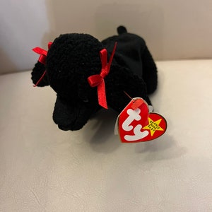 Vintage TY Gigi-Poodle-Beanie baby-New with tag errors-in pristine condition. Birth 04-07-1997. Smoke free home and stored in plastic.