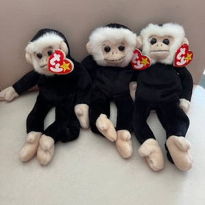 TY Beanie Baby-Mooch- In pristine condition with tags-Birth-08-01-1997- Comes from a smoke free home and stored in plastic bins.