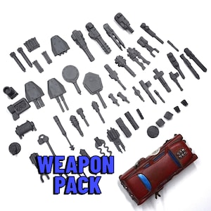 May include: A collection of gray miniature weapons and vehicle parts, including guns, hammers, and key-shaped items. A red car model is also present. The text "WEAPON PACK" is displayed in blue.