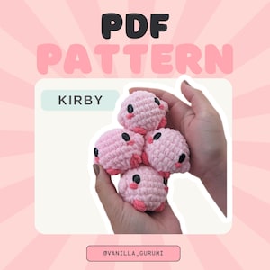 May include: A PDF pattern for crocheting a pink Kirby character from the video game series. The pattern is available for download from the Etsy shop @vanillla_gurumi.