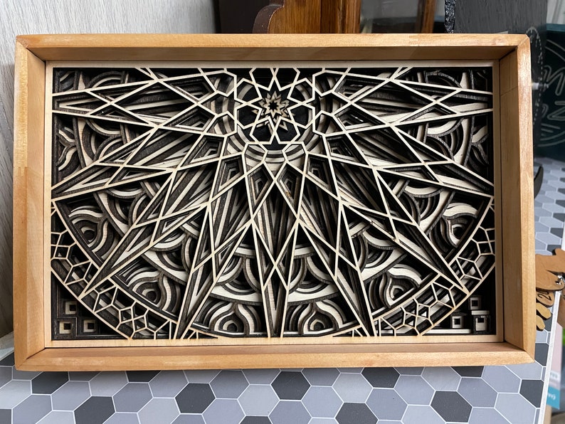 Transform your home into a cozy sanctuary with this laser cute wooden mandala. This spiritual wall decor is sure to captivate and inspire anyone who lays eye on it. This laser cut mandala art gives your space a warm impression. Spiritual Gift Idea.