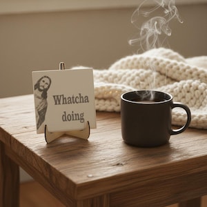 Funny Jesus Tile | Ceramic Jesus Saying Tile with "Whatcha Doing" | Religious Humor Gift | Catholic Christian Home Decor | Divine Comedy shown in an AI-generated listing photo