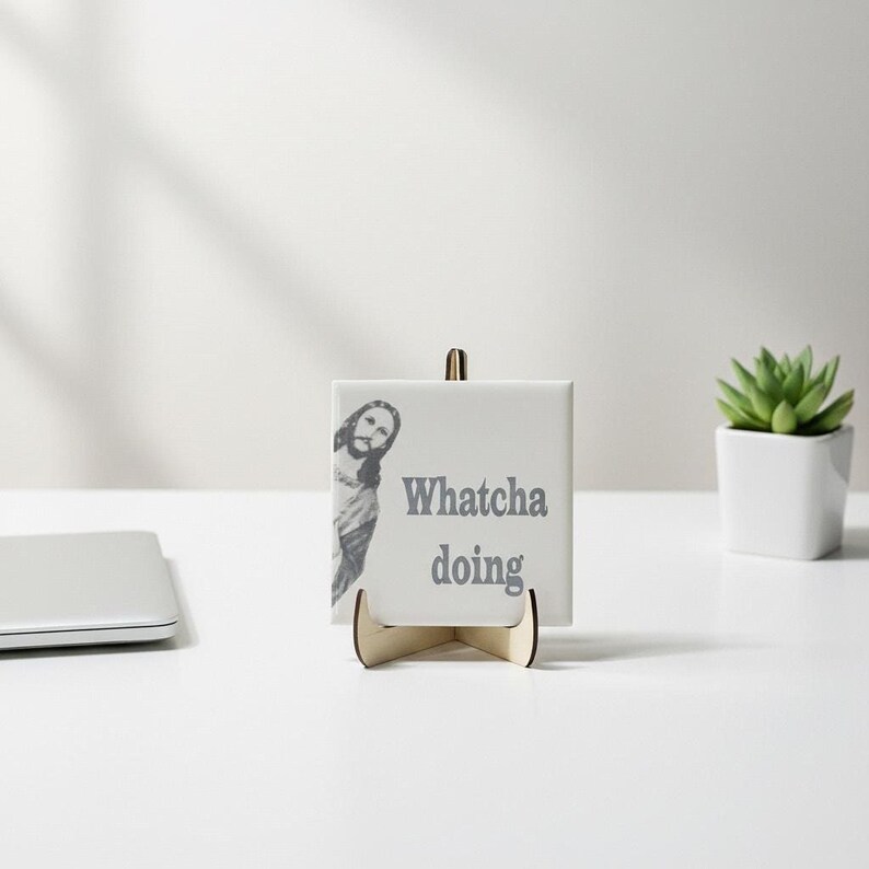 Funny Jesus Tile | Ceramic Jesus Saying Tile with "Whatcha Doing" | Religious Humor Gift | Catholic Christian Home Decor | Divine Comedy shown in an AI-generated listing photo