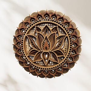 A layered wooden lotus mandala with light and dark wood tones is shown in a close-up, centered on a light gray background with soft shadows.