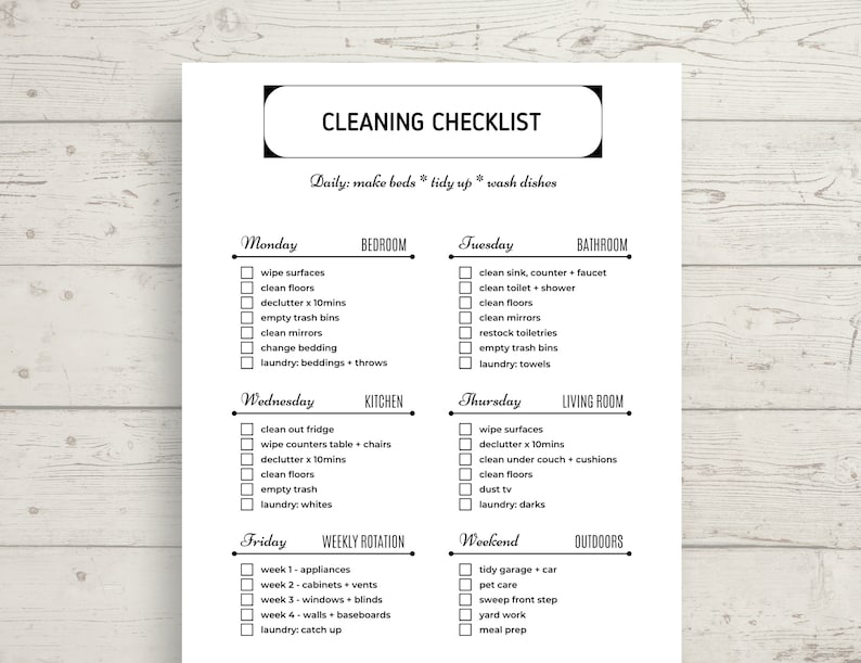May include: A black and white printable cleaning checklist with a daily, weekly, and weekend schedule. The checklist includes tasks for the bedroom, bathroom, kitchen, living room, and outdoors.
