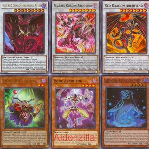 May include: A collection of ten trading cards featuring various red dragon monsters from the Yu-Gi-Oh! Trading Card Game. The cards feature illustrations of the monsters in various poses, with some cards showing the monsters in battle.