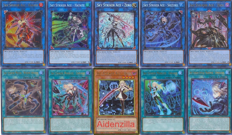 May include: A collection of Yu-Gi-Oh! trading cards featuring the "Sky Striker Ace" series. The cards display various characters in dynamic poses with vibrant colors, including red, green, blue, and gold. The text "SKY STRIKER ACE" is visible on several cards.