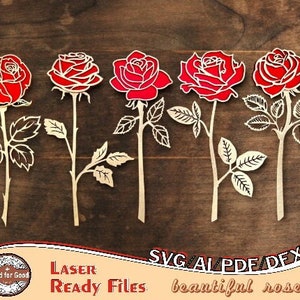 May include: Five red rose flower cutouts with stems and leaves. The roses are laser cut and ready to be used for crafting projects.