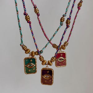 Collier cordon tressé et coloré ajustable pendentif amulette carte de tarot œil protecteur en acier inoxydable