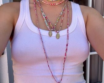 2-in-1 necklace: long necklace or double strand necklace with a blank pendant and adjustable floral Liberty cord in colored stainless steel
