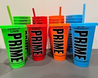 May include: Six different flavors of Prime Hydration drink in reusable tumblers with straws. The flavors are Lemon Lime, Tropical Punch, Orange, Blue Raspberry, Lemon, and Blue.
