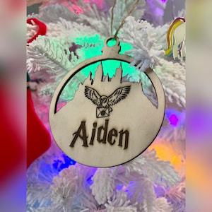 Personalized laser engraved Christmas ornament. Made to order. Can include favorite things or animals.