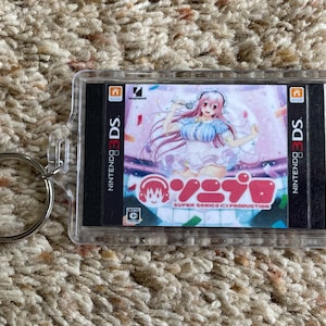 Super Sonico in Production &quot;Video Game Cover Art Custom Key Chain Display, Christmas Tree Ornament&quot;s - Nintendo 3DS