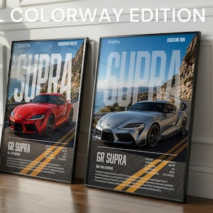 Könnte beinhalten: Zwei gerahmte Poster mit Toyota GR Supra Autos. Das linke Poster zeigt ein rotes Auto mit dem Text RENAISSANCE RED 2.0, das rechte ein silbernes Auto mit dem Text COASTLINE RUN. Beide Poster enthalten den Schriftzug DUAL COLORWAY EDITION.