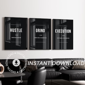 May include: A set of three black wall art prints featuring white text. The first print reads HUSTLE, the second reads GRIND, and the third reads EXECUTION. Each print includes the word VERB and a short definition below the main title.